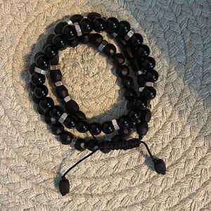 Stacking bracelets, black and silver